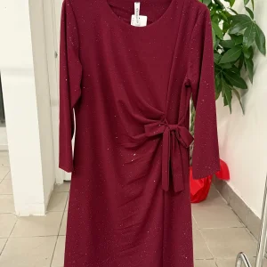 Abito lungo brillantinato con fiocco laterale