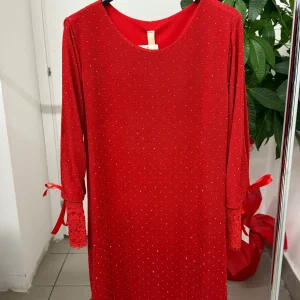 Abito brillantinato con fiocco e pizzo sulle maniche