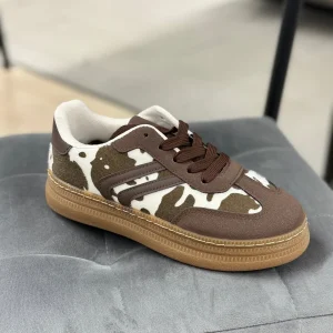 Sneakers con pelliccia maculata