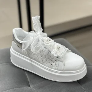 Sneakers platform alta con fiori