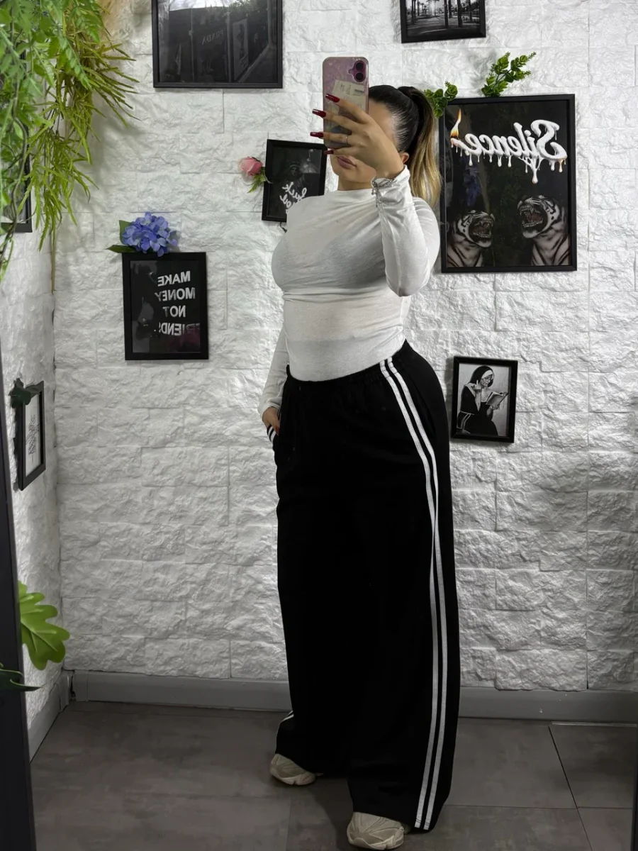 Pantalone a palazzo in tuta con riga laterale a contrasto - immagine 3