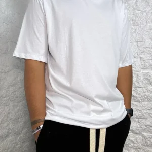 T-shirt bianca in tinta unita con mezzo collo alto