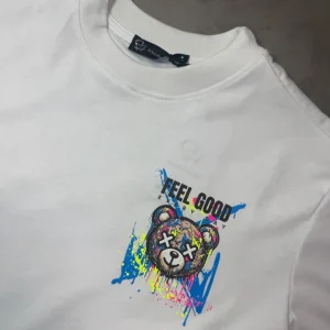 T-shirt bianca con stampa orso e scritta "FEEL GOOD" - OVERSIZE 10-16 anni